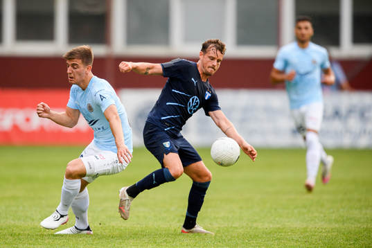 Marko Djurisic of Riga and Eric Larsson of Malmö FF