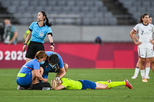 Stina Blackstenius of Sweden receives medical treatment