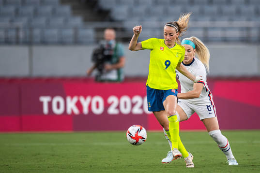 Kosovare Asllani of Sweden and Julie Ertz of USA
