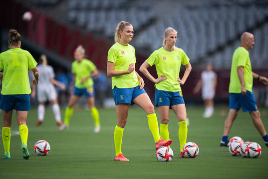 Fridolina Rolfö and Stina Blackstenius of Sweden