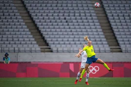Abby Dahlkemper of USA and Stina Blackstenius of Sweden