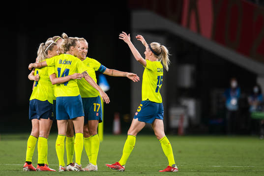 Players of Sweden celebrate
