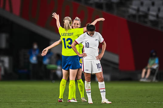 Hanna Glas and Amanda Ilestedt of Sweden celebrate while