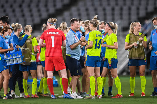 Peter Gerhardsson, head coach of Sweden, celebrate with the