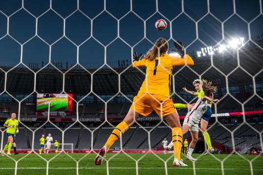 Lina Hurtig of Sweden scores the 3-0 goal behind goalkeeper