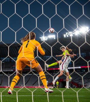 Lina Hurtig of Sweden scores the 3-0 goal behind goalkeeper