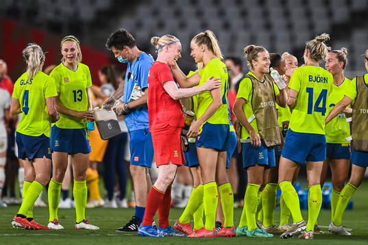 Goalkeeper Hedvig Lindahl and Fridolina Rolfö of Sweden