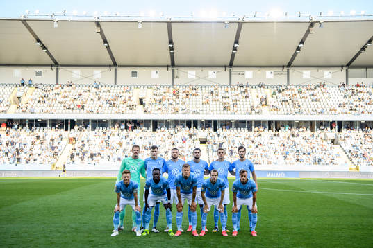 The starting eleven of Malmö FF poses for a photo prior to