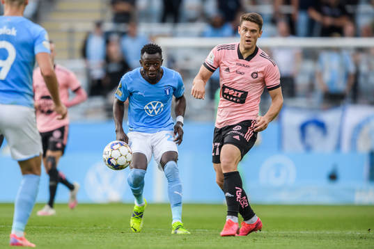 Bonke Innocent of Malmö FF and Filip Valencic of