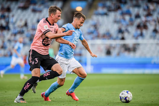 Janne Saksela of Helsingfors and Eric Larsson of Malmö FF