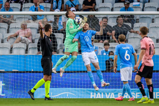 goalkeeper Johan Dahlin and Lasse Nielsen of Malmö FF