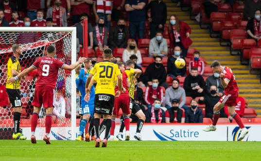 Andrew Considine of Aberdeen scores the 1-0 goal