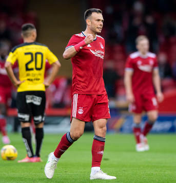 Andrew Considine of Aberdeen celebrates