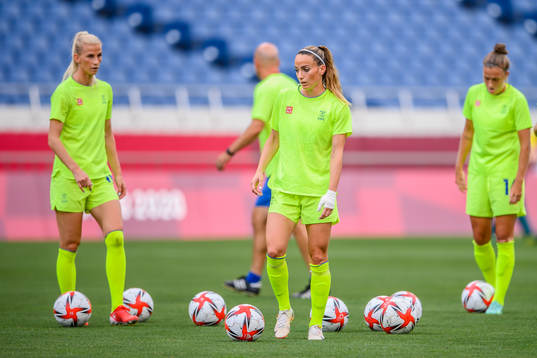 Sofia Jakobsson and Kosovare Asllani of Sweden prior to the