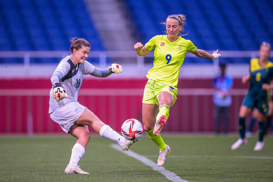 Teagan Micah of Australia and Kosovare Asllani of Sweden