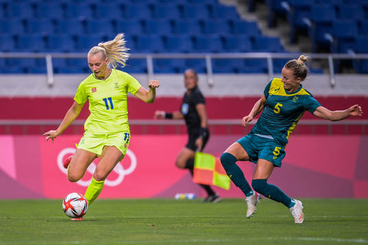 Stina Blackstenius of Sweden and Aivi Luik of Australia