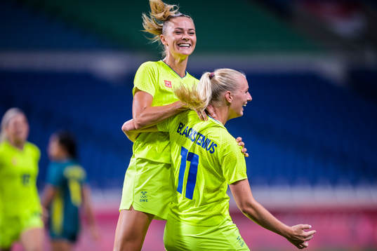 Fridolina Rolfö and Stina Blackstenius of Sweden celebrate