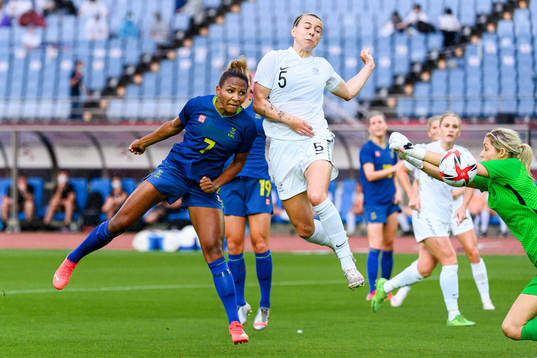Madelen Janogy of Sweden scores the 0-2 goal behind