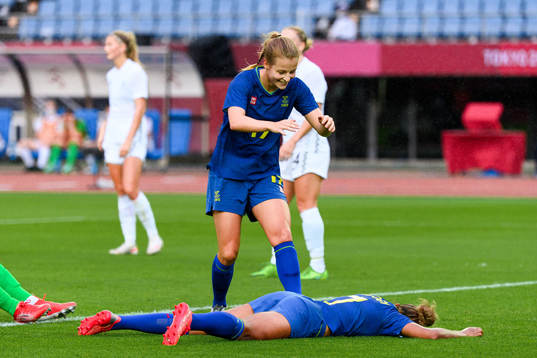 Anna Anvegård and Madelen Janogy of Sweden celebrate the