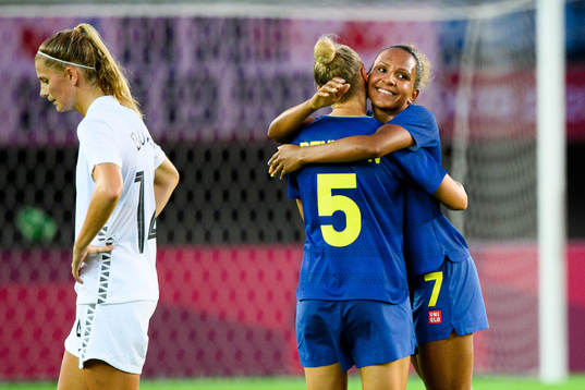 Hanna Bennison and Madelen Janogy of Sweden celebrate
