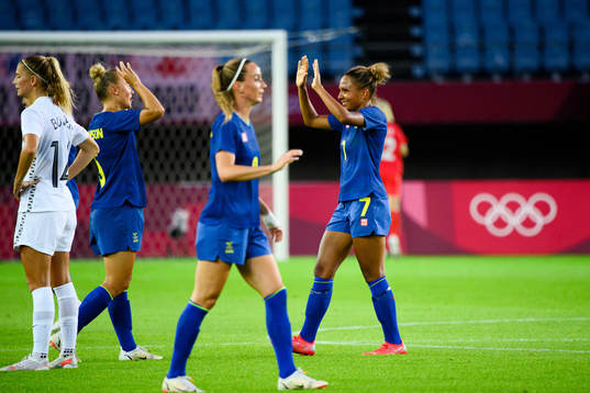 Hanna Bennison and Madelen Janogy of Sweden celebrate