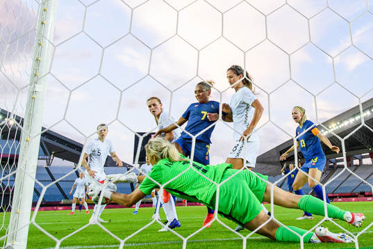 Madelen Janogy of Sweden against goalkeeper Erin Nayler of