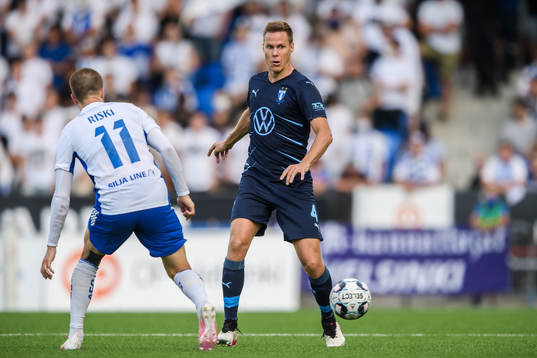 Roope Riski of Helsinki and Niklas Moisander of Malmö FF