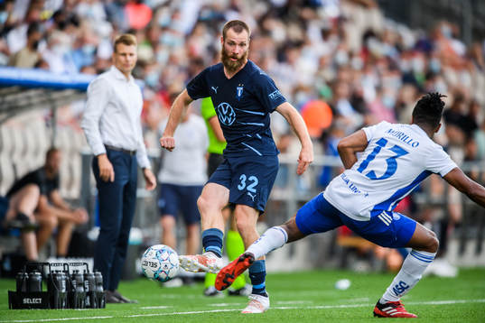 Jo Inge Berget of Malmö FF and Luis Carlos Murillo of