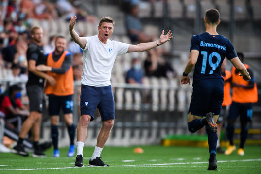 Jon Dahl Tomasson, head coach, and Veljko Birmancevic of