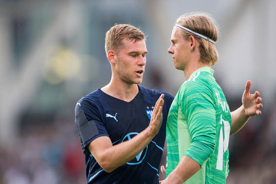 Felix Beijmo of Malmö FF and goalkeeper Jakob Tånnander