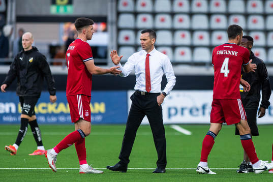 Declan Gallagher and Stephen Glass, head coach of Aberdeen,