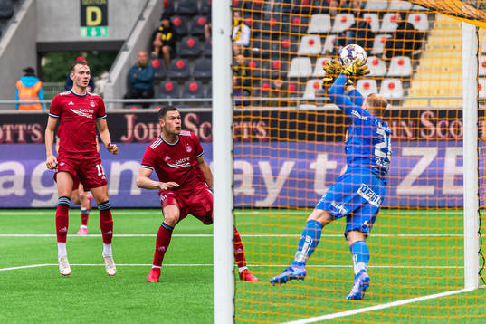 Christian Ramirez of Aberdeen is denied a goal by