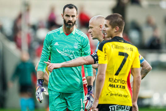 goalkeeper Joe Lewis of Aberdeen looks dejected