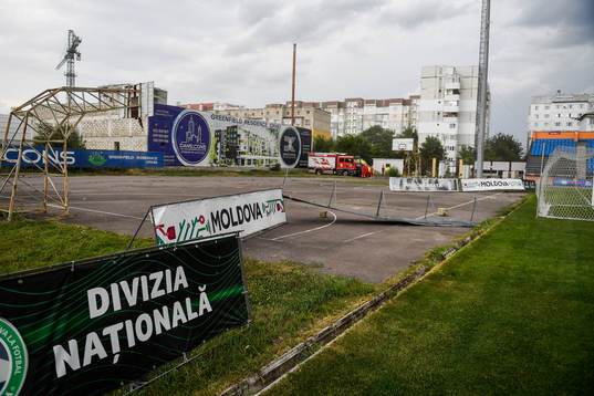 Commercial signs blow away in heavy winds