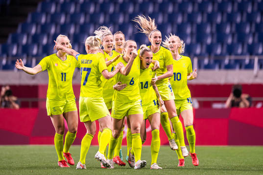 Magdalena Eriksson of Sweden celebrate with teammates