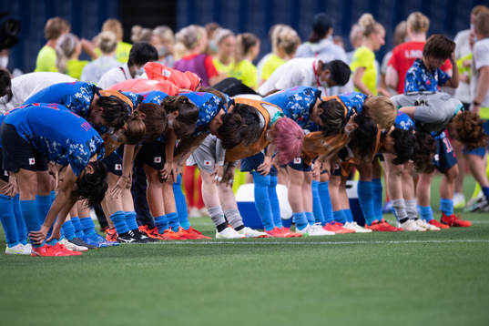 The Japanese team bows