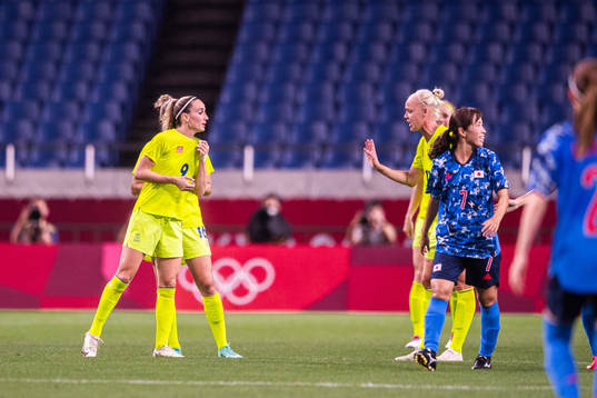 Kosovare Asllani and Caroline Seger of Sweden