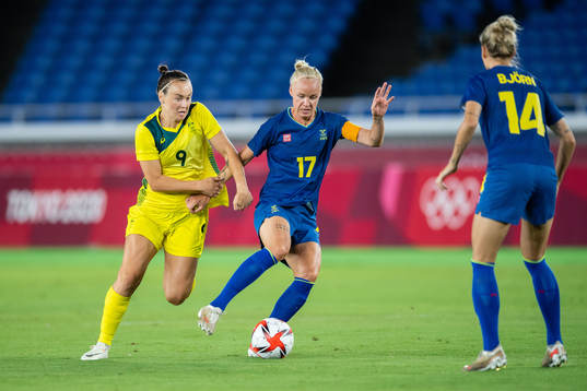 Caitlin Foord of Australia and Caroline Seger of Sweden in