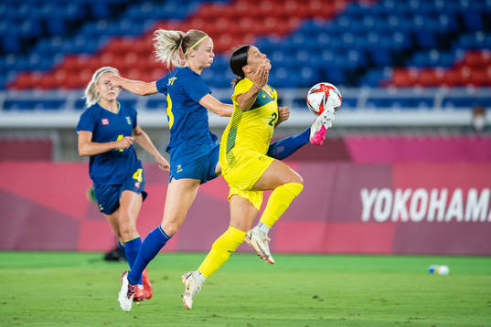 Amanda Ilestedt of Sweden and Sam Kerr of Australia  in the
