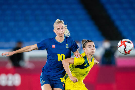 Sofia Jakobsson of Sweden and Steph Catley of Australia in