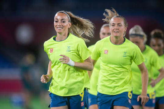 Kosovare Asllani and Magdalena Eriksson of Sweden