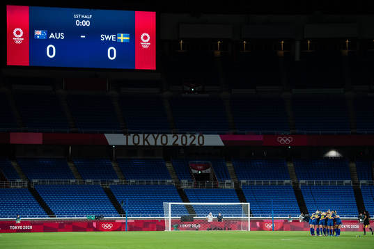 Players of Sweden in front of empty stands