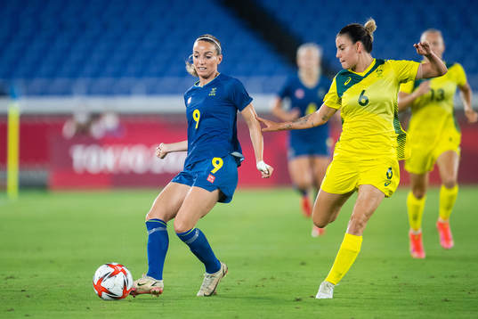 Kosovare Asllani of Sweden and Chloe Lagarzo of Australia