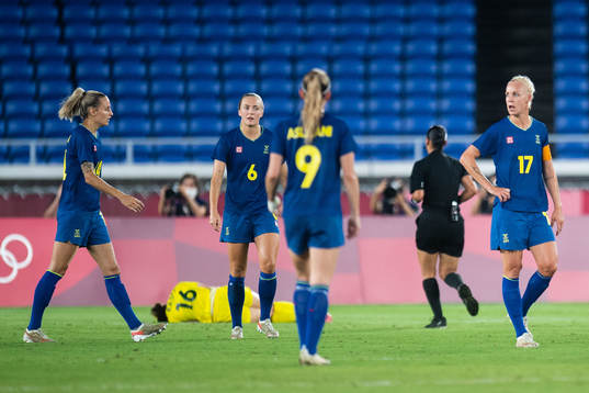 Magdalena Eriksson and Caroline Seger of Sweden and Hayley