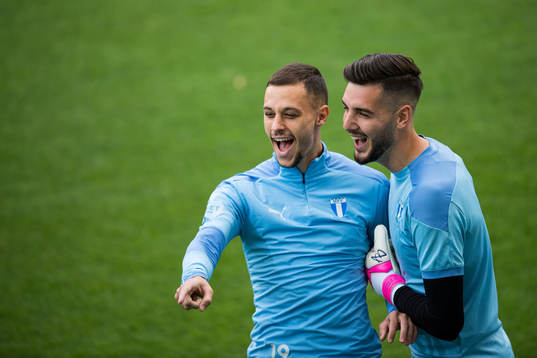 Veljko Birmancevic and goalkeeper Marko Johansson