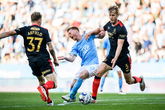 Anders Christiansen of Malmö FF and Filip Helander of