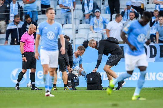 Sören Rieks of Malmö FF receives medical attention