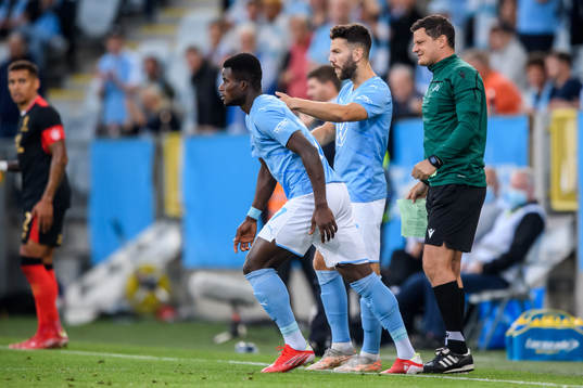 Malik Abubakari of Malmö FF enters the pitch