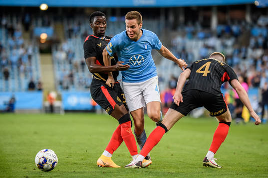 Junior Fashon Sakala and John Lundstram of Rangers against