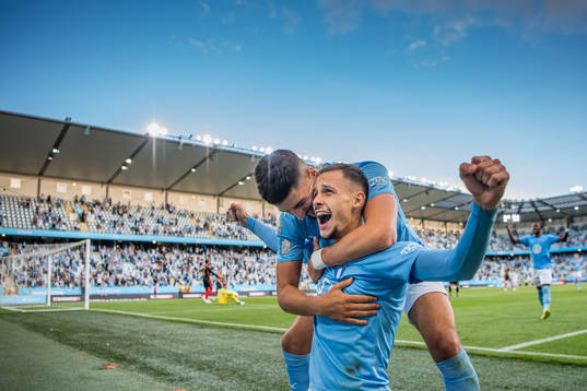 Veljko Birmancevic celebrate with Antonio Colak of Malmö FF